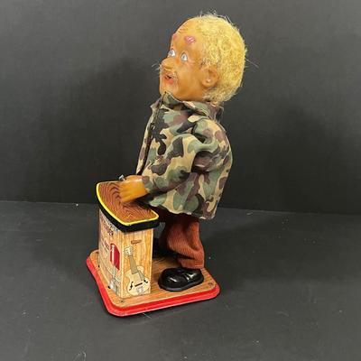 LOT 194: Vintage Tin Toys, Cast iron Soldier