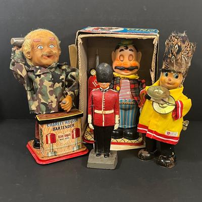 LOT 194: Vintage Tin Toys, Cast iron Soldier