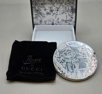 LOT 212J: Gucci Mirror Compact, DKNY Key Holder, and Cameo Brooch