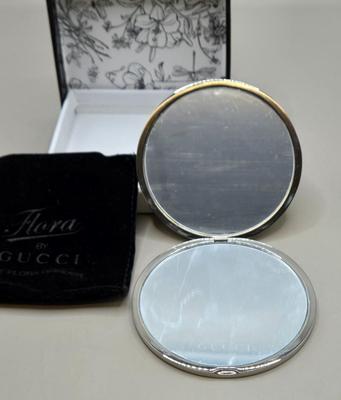 LOT 212J: Gucci Mirror Compact, DKNY Key Holder, and Cameo Brooch