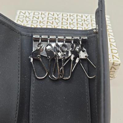 LOT 212J: Gucci Mirror Compact, DKNY Key Holder, and Cameo Brooch