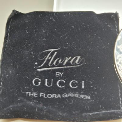 LOT 212J: Gucci Mirror Compact, DKNY Key Holder, and Cameo Brooch