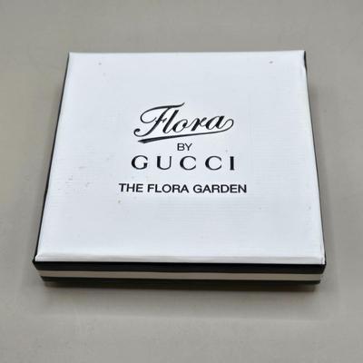 LOT 212J: Gucci Mirror Compact, DKNY Key Holder, and Cameo Brooch