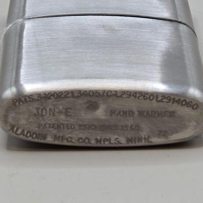 LOT 215J: Philadelphia Street and Trolly Guide for 1929, Jon-e Warmer, Fishing Pole Tie Pin with Matching Cuff Links, and More