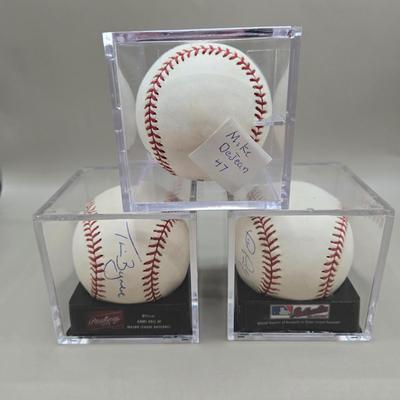 LOT 218: Tim Byrdak, John Parrish, and Mike DeJean Signed Baseballs/ No COA