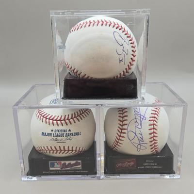 LOT 219: Jay Gibbons, Rick Dempsey, and Brian Burres Signed Baseballs/ No COA