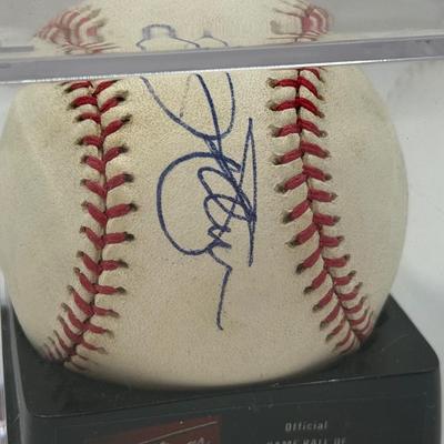 LOT 233: Rawlings Baseball in Display Case signed by Jim Palmer
