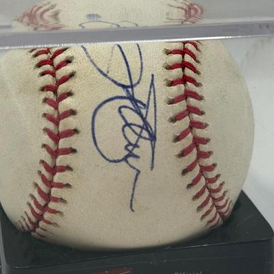 LOT 233: Rawlings Baseball in Display Case signed by Jim Palmer
