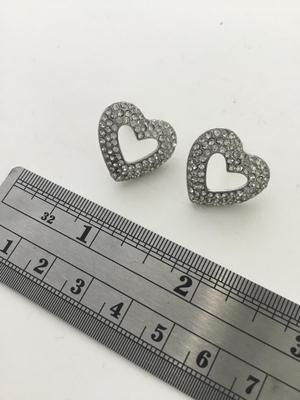 Unmarked heart rhinestone stud earrings