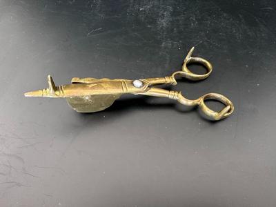 Antique brass candle snuffer
