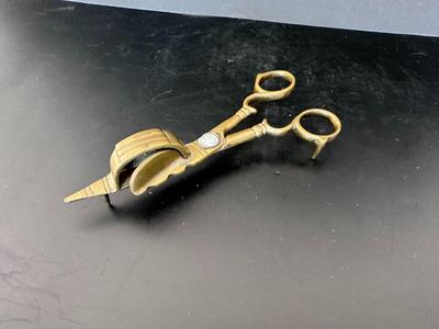 Antique brass candle snuffer