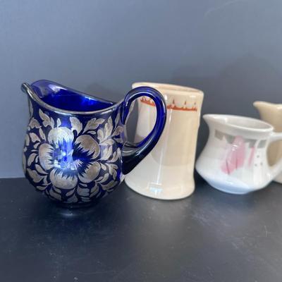 Lot of 4 Syrup Pitchers