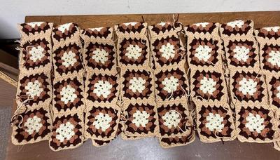 8 rows of Unassembled Granny Squares approx 4" each that can be sewn together brown tans