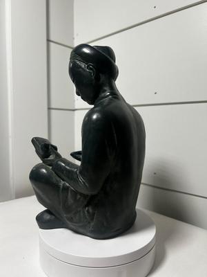 Studious Statue