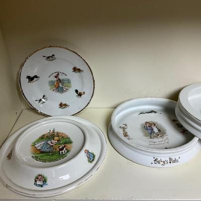 UBC1515 Two Shelves of Antique Baby Plates