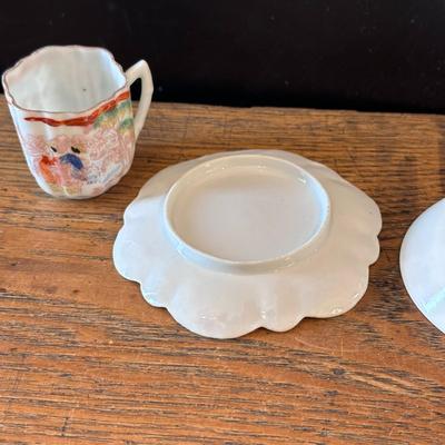 China Teacup, saucer, and Wedgwood plate, signed