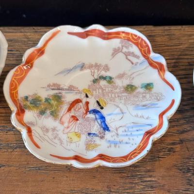 China Teacup, saucer, and Wedgwood plate, signed