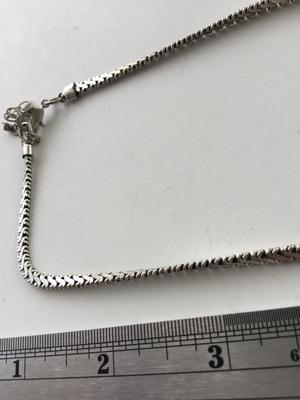 Unmarked chain like silver tone adjustable bracelet