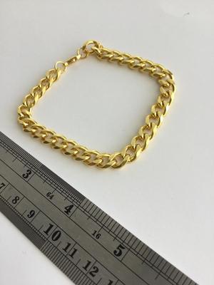 Gold tone chain link type fashion unmarked bracelet