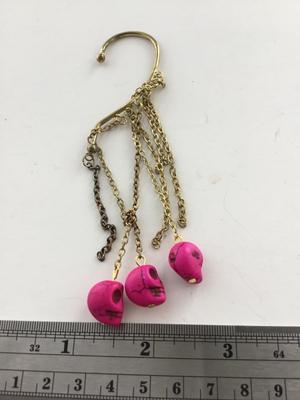 Pink skull dangle over ear jewelry
