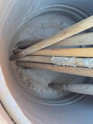 Large Barrel of Mixed Farm Tools and handles