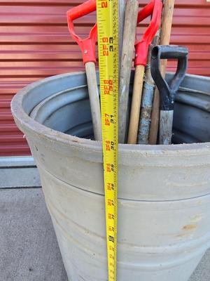 Large Barrel of Mixed Farm Tools and handles