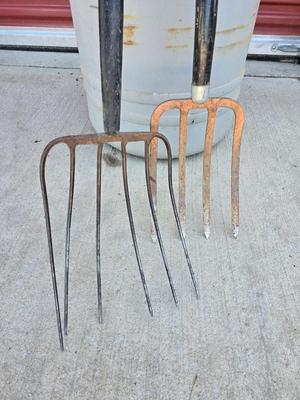 Large Barrel of Mixed Farm Tools and handles