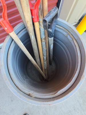 Large Barrel of Mixed Farm Tools and handles