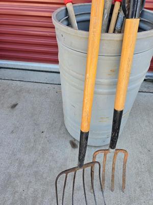 Large Barrel of Mixed Farm Tools and handles