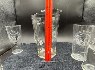 Sale Photo Thumbnail #207: 6 glasses and matching pitcher.  Designs are etched into the glass. All in good condition.