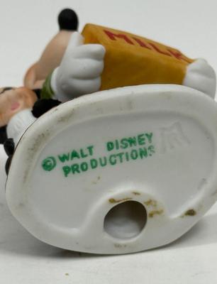 Sale Photo Thumbnail #465: Very good condition, no damage, chips or cracks. Stamped MR on the bottom. This super cute vintage authentic Walt Disney Mickey Mouse porcelain figurine is dressed as a milkman, he is carrying a crate of milk bottles, and has his pal Figaro the Cat is at 