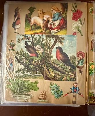 Sale Photo Thumbnail #304: Scrapbook in fair condition, with Victorian artwork influenced pages mostly glued in.