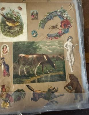 Vintage scrap book with loose pages