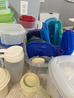 Various plastic containers and lids