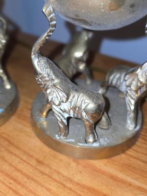 Brass Figurines. Elephants holding globes