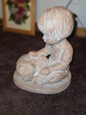 Ceramic Pottery. Boy and Pig