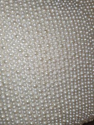 Pair of Pearl Beaded throw pillows.