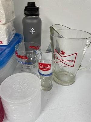 Brita pitcher, and glasses, plastic containers, napkins, Britta, water, pitcher, and more