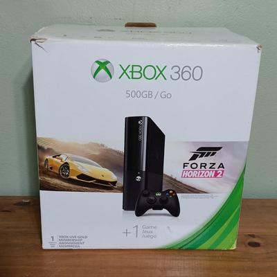 LOT 11: XBox 360 E Console with Controllers & More