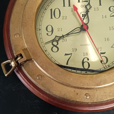 LOT 13: Bey Berk Brass Porthole Clock with Wooden Ship's Wheel Mirror & Lighthouse Wall Decor