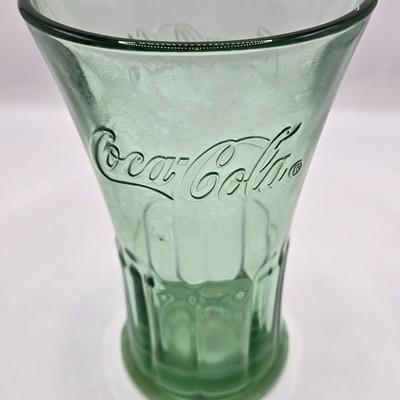 LOT 28: Have a Coke and a Smile/ Coca-Cola Glasses, Bottles, Metal Bottle Opener, and Framed Mirror