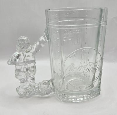LOT 28: Have a Coke and a Smile/ Coca-Cola Glasses, Bottles, Metal Bottle Opener, and Framed Mirror