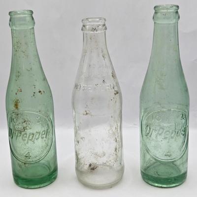 LOT 28: Have a Coke and a Smile/ Coca-Cola Glasses, Bottles, Metal Bottle Opener, and Framed Mirror