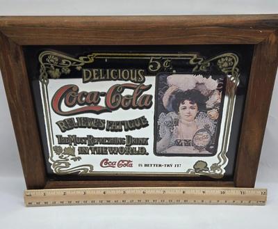 LOT 28: Have a Coke and a Smile/ Coca-Cola Glasses, Bottles, Metal Bottle Opener, and Framed Mirror