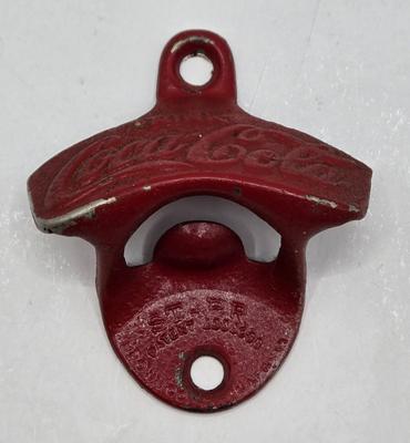 LOT 28: Have a Coke and a Smile/ Coca-Cola Glasses, Bottles, Metal Bottle Opener, and Framed Mirror