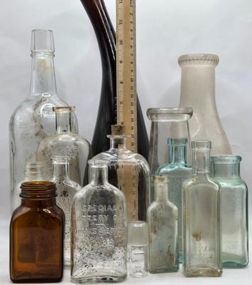LOT 30: Cumberland Dairy Bottle, National Remedy Company Bottle, and Many More