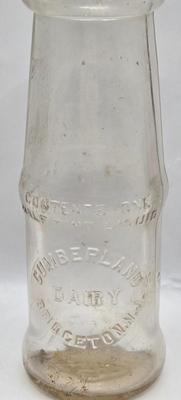 LOT 30: Cumberland Dairy Bottle, National Remedy Company Bottle, and Many More