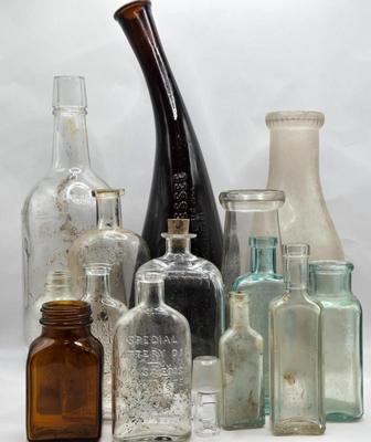 LOT 30: Cumberland Dairy Bottle, National Remedy Company Bottle, and Many More