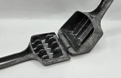 LOT 36: Vintage Kitchen Gadgets Including Hand Held Ice Crusher, Potato Masher, Cheese Graters, Can Opener, and More