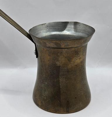 LOT 36: Vintage Kitchen Gadgets Including Hand Held Ice Crusher, Potato Masher, Cheese Graters, Can Opener, and More